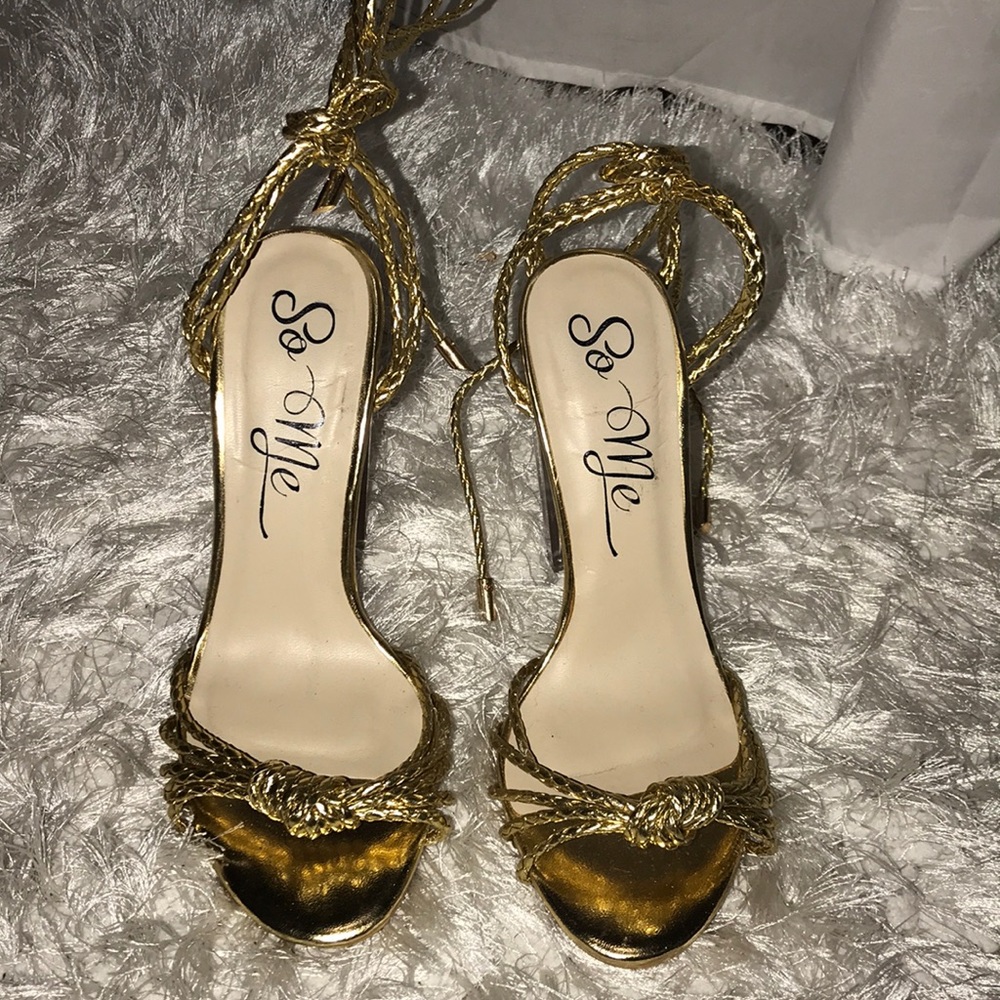 Gold ankle strapped heels